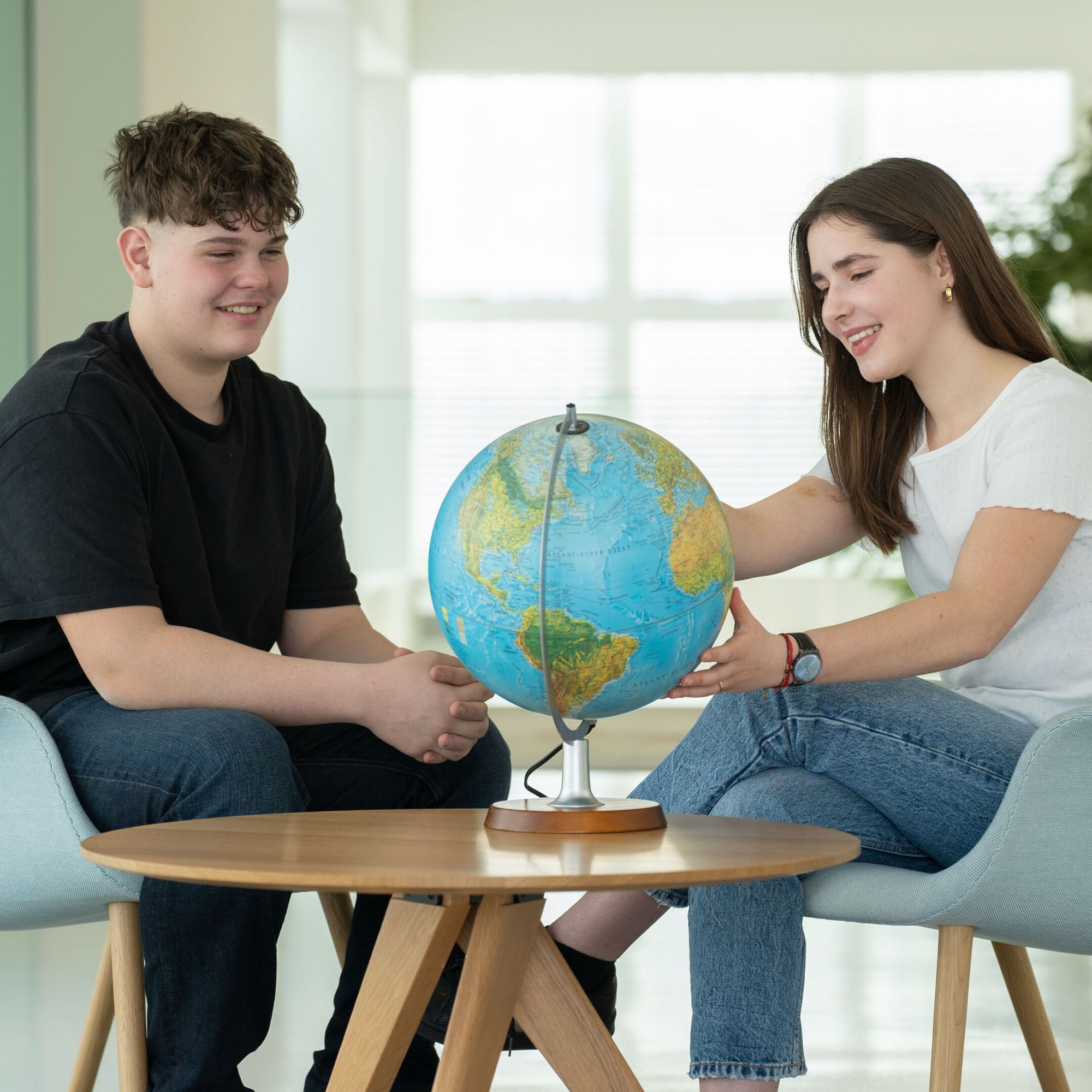 Apprentices sitting around in a table