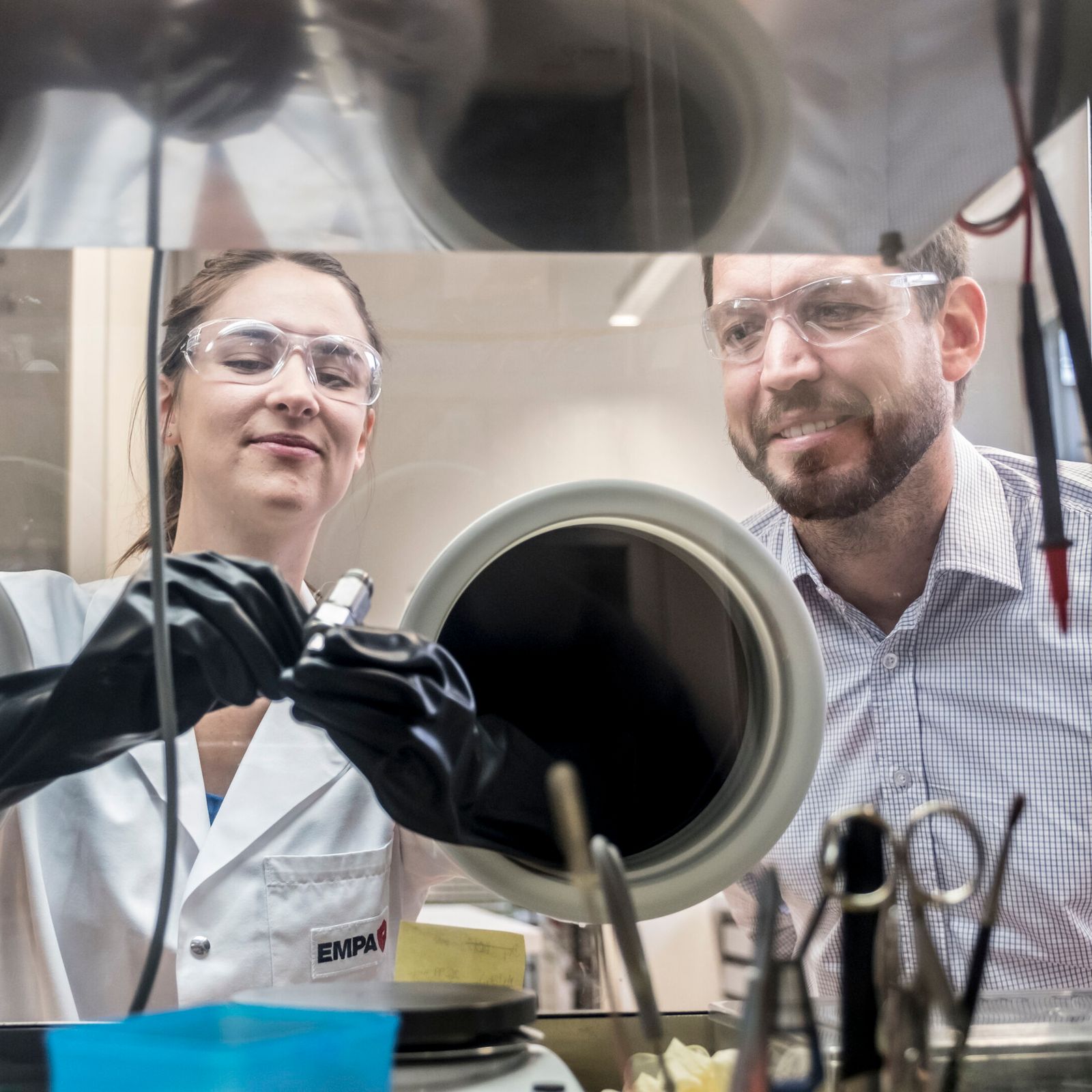 Corsin Battaglia and postdoctoral researcher, Marie-Claude Bay in the laboratory of the Swiss Federal Laboratories for Materials Testing and Research (Empa).