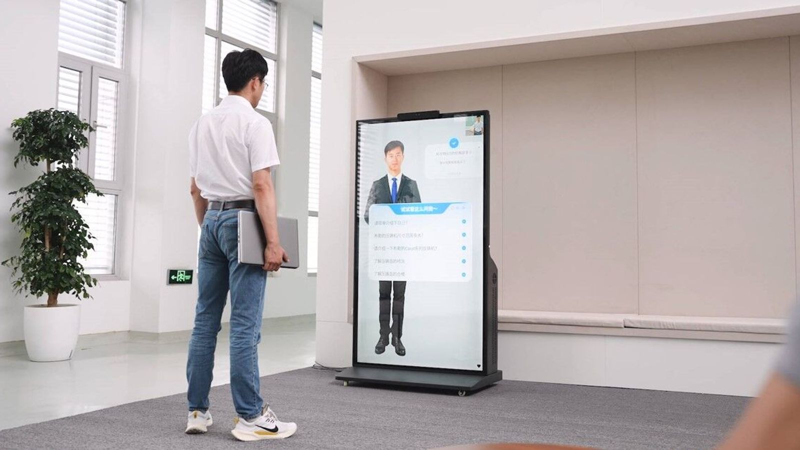 Gao Lei interacts with his digital avatar.