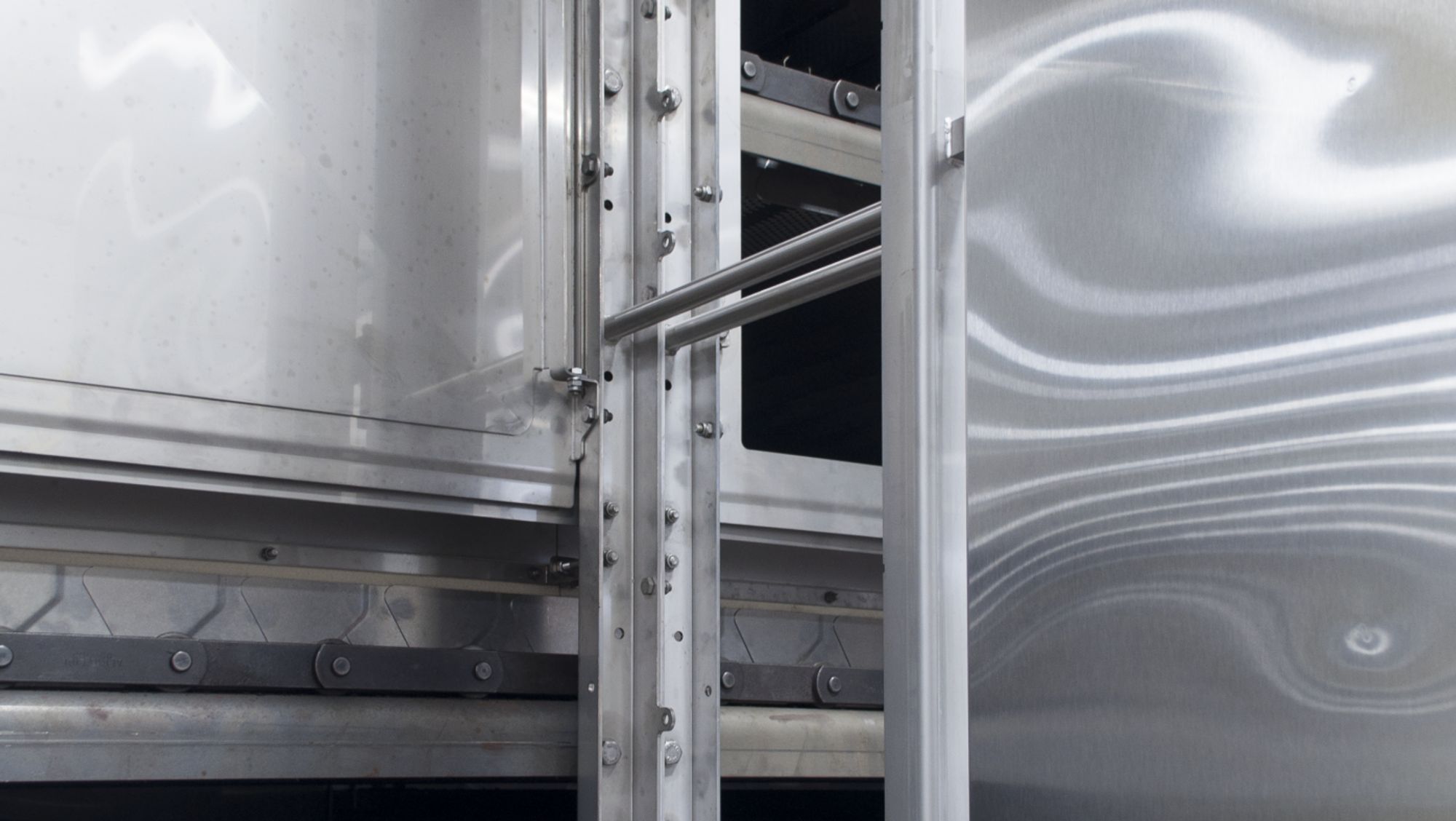 Open channel vertical frame in the interior of a dryer
